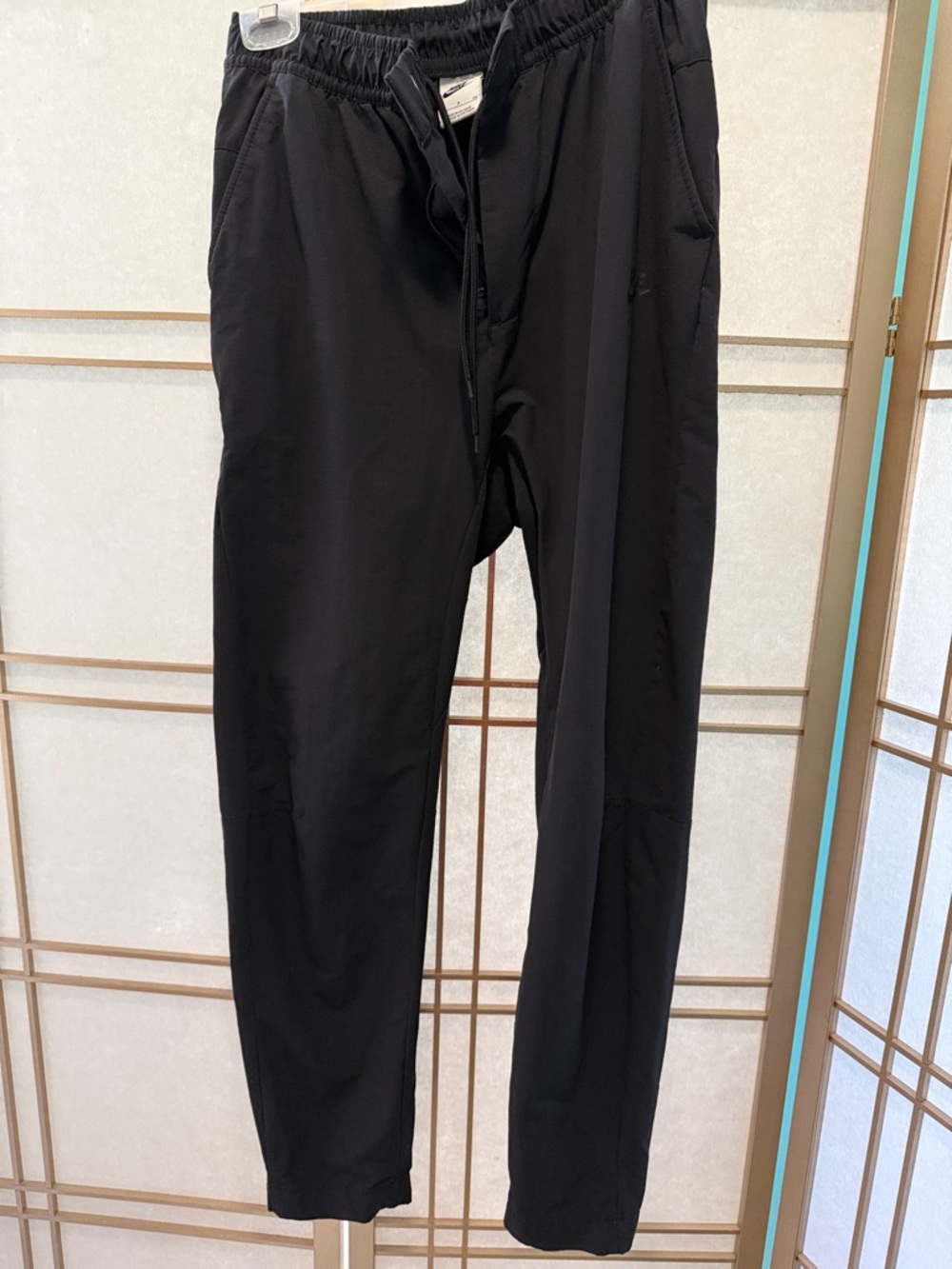 Nike Athletic pants with elastic waist & zip fly & button closure, men’s small